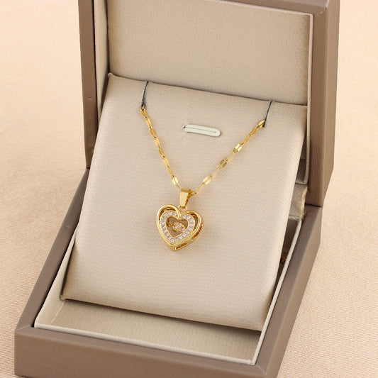 Golden 3D Heart Pendant with Sparkling Crystal Accent