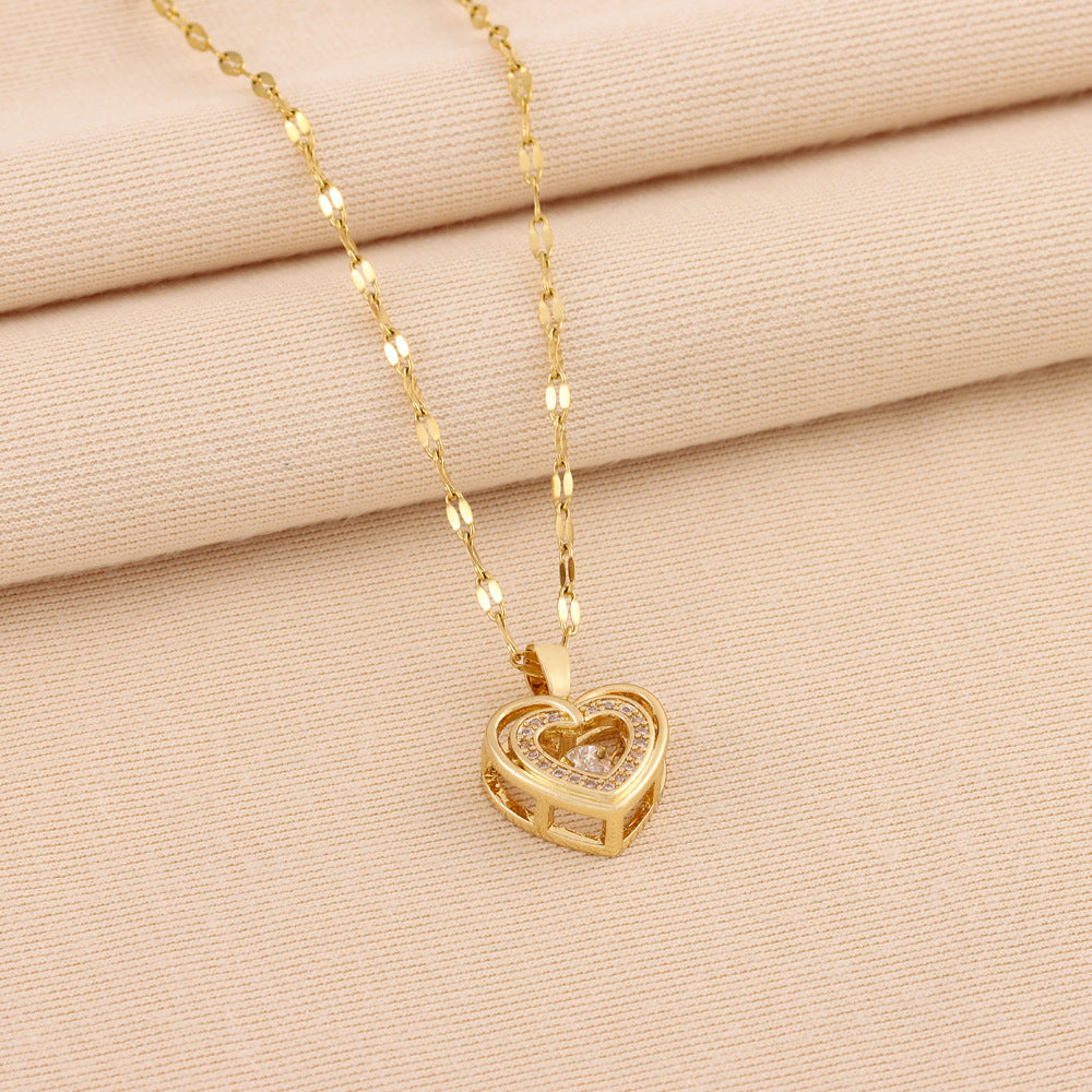 Golden 3D Heart Pendant with Sparkling Crystal Accent