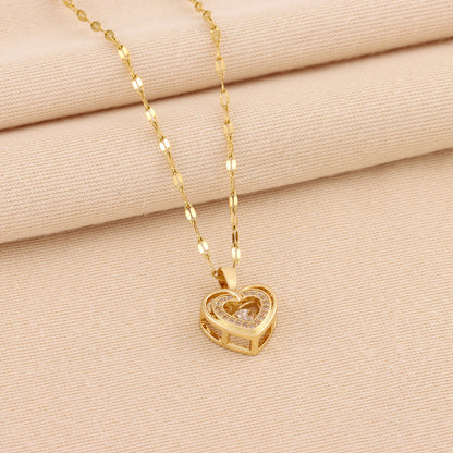 Golden 3D Heart Pendant with Sparkling Crystal Accent