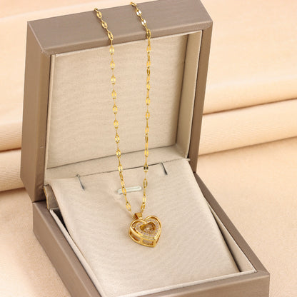 Golden 3D Heart Pendant with Sparkling Crystal Accent