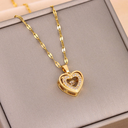 Golden 3D Heart Pendant with Sparkling Crystal Accent
